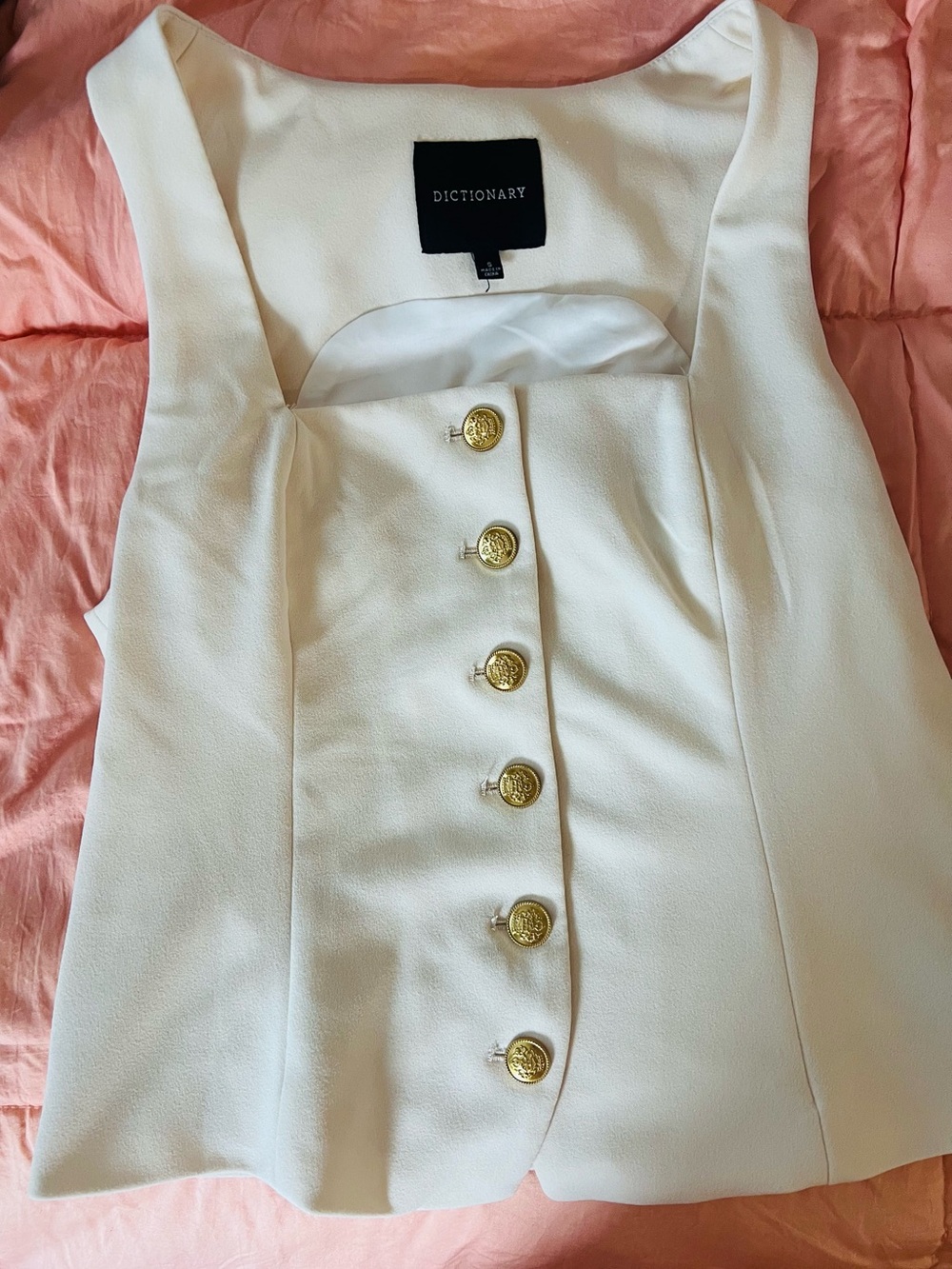 Dictionary top with gold buttons